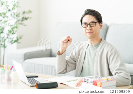 A man in his 30s aiming to improve his skills at home A man in his 30s aiming to improve his skills at home 121509809