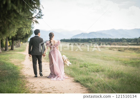 Bride and groom holding hands in a dress in a park (wedding, marriage, romance, bridal, antique) Bride and groom holding hands in a dress in a park (wedding, marriage, romance, bridal, antique) 121510134
