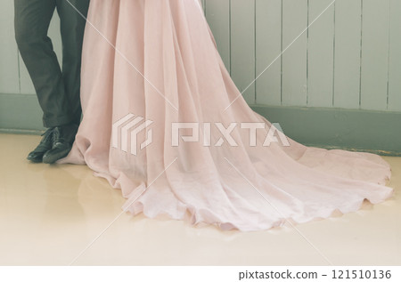 Couple taking wedding photos in a retro building 121510136