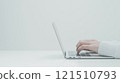 A woman's hand to operate a laptop computer 121510793