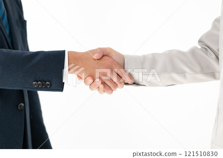 A man and a businessman in work clothes shaking hands A man and a businessman in work clothes shaking hands 121510830