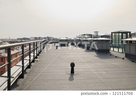 A stunning modern rooftop view showcasing a vibrant cityscape in a contemporary setting 121511708
