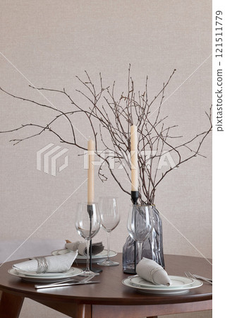 Create a minimalist table setting with natural elements for a lovely atmosphere 121511779