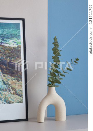 Explore Modern Minimalist Decor Featuring Eucalyptus in a Beautifully Stylish Vase Explore Modern Minimalist Decor Featuring Eucalyptus in a Beautifully Stylish Vase 121511792