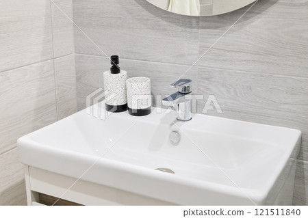 Contemporary and Modern Bathroom Sink Featuring Stylish Minimalist Accessories and Decor Contemporary and Modern Bathroom Sink Featuring Stylish Minimalist Accessories and Decor 121511840