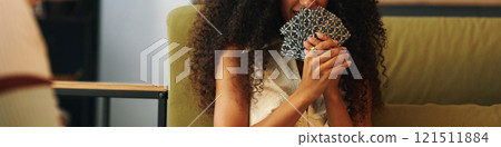 Girl Playing Cards With Friends Girl Playing Cards With Friends 121511884