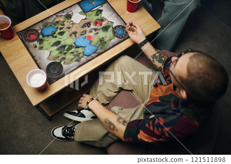 Man Playing Game With Friends Man Playing Game With Friends 121511898