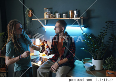 Friends Toasting With Bottles Of Beer 121511982