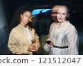 Girls Drinking Wine At Party 121512047