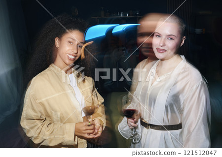 Girls Drinking Wine At Party 121512047