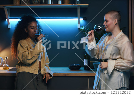 Girls Drinking Red Wine At Party 121512052