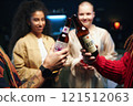 Friends Toasting With Beer At Party 121512063