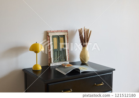 Stylish MidCentury Decor Beautifully Arranged on a Fabulous Black Dresser Surface 121512180