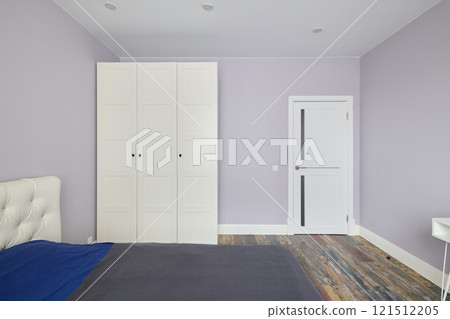 A Modern and Minimalist Bedroom featuring Soft Purple Walls that evoke serenity and style 121512205