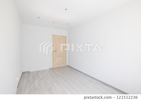 A minimalistic empty room with a wooden door and neutral tones, inspiring modern decor ideas A minimalistic empty room with a wooden door and neutral tones, inspiring modern decor ideas 121512236