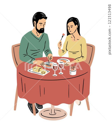 Young beautiful couple having dinner in a cafe restaurant 121513498