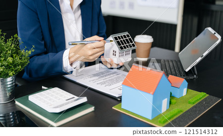 Considering buying a home, investing in real estate. Broker signs a sales agreement. agent, lease agreement, successful Considering buying a home, investing in real estate. Broker signs a sales agreement. agent, lease agreement, successful 121514312