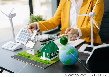 Business planning hand using laptop for working technology and business Net zero and carbon neutral concept.NET ZERO Business planning hand using laptop for working technology and business Net zero and carbon neutral concept.NET ZERO 121514317