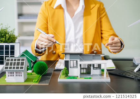 Signing a contract. Client and broker agent, lease agreement, successful deal and Young business sitting at the desk Signing a contract. Client and broker agent, lease agreement, successful deal and Young business sitting at the desk 121514325