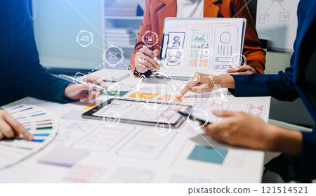 UX developer and ui designer brainstorming about mobile app interface wireframe design with customer breif 121514521