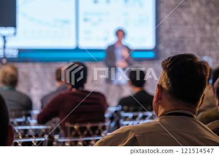 Audience attentively watching business presentation in conference 121514547