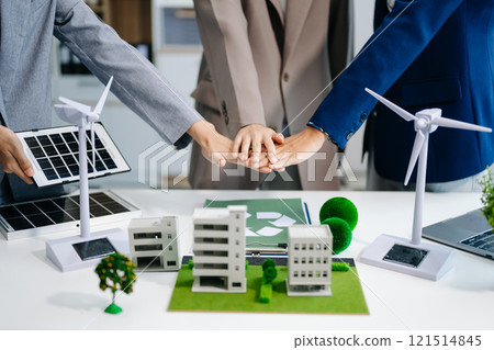 business team people planning and discussing on recycle reduce reuse policy symbol in office meeting room. Green business company and Solar Energy 121514845