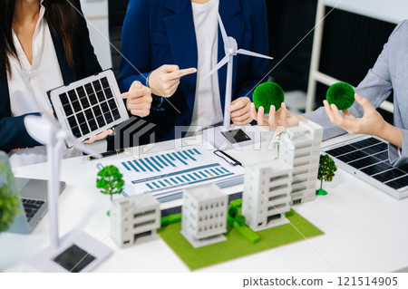 business team people planning and discussing on recycle reduce reuse policy symbol in office meeting room. Green business company and Solar Energy 121514905