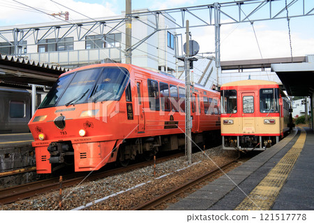 The Huis Ten Bosch Express and Amagi Railway AR300 series diesel railcar passing through Kiyama Station The Huis Ten Bosch Express and Amagi Railway AR300 series diesel railcar passing through Kiyama Station 121517778