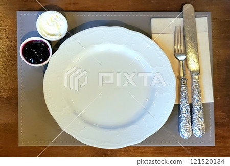 Sweet dish setting on a wooden table 121520184