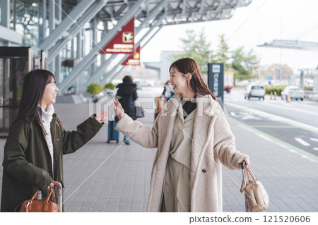 Image of girls excited before leaving on a trip Image of girls excited before leaving on a trip 121520606