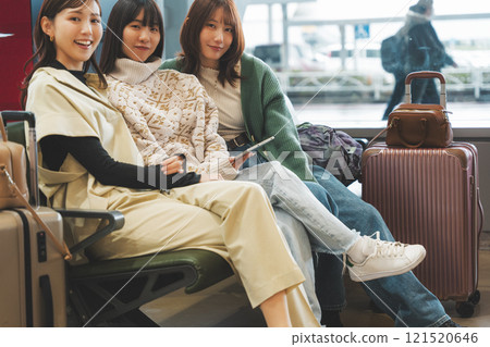 Image of girls excited before leaving on a trip Image of girls excited before leaving on a trip 121520646