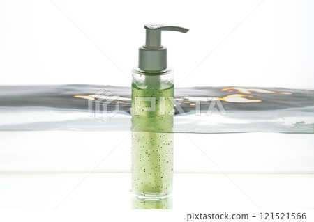 A bottle of cosmetic product in water. 121521566