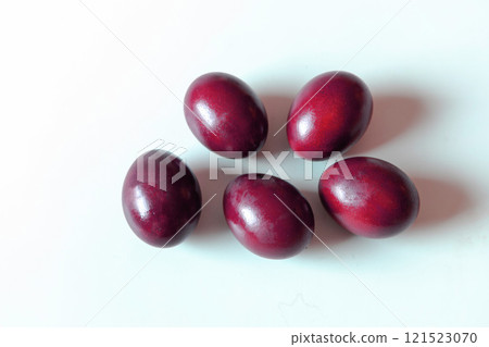 Traditional red easter eggs. Chicken eggs are painted red Traditional red easter eggs. Chicken eggs are painted red 121523070