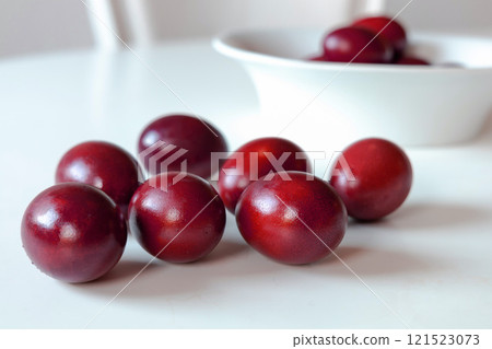 Traditional red easter eggs. Chicken eggs are painted red Traditional red easter eggs. Chicken eggs are painted red 121523073