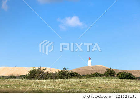 Rubjerg Knude Lighthouse on the coast of the North Sea in the Jutland in northern Denmark. Rubjerg Knude Lighthouse on the coast of the North Sea in the Jutland in northern Denmark. 121523133