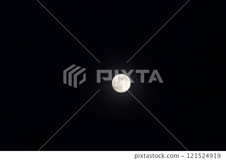 Full Moon Seen During an Early Evening 121524919