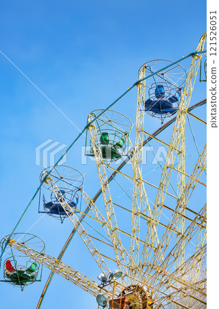 Amazing view of snow covered ferris wheel surrounded by snowcovered trees. 121526051