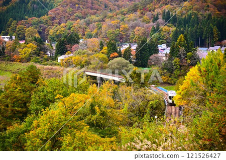 Autumn on the JR Kitakami Line's First Waga River Bridge Autumn on the JR Kitakami Line's First Waga River Bridge 121526427