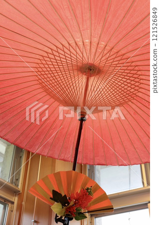Inside the large umbrella used for outdoor tea ceremony in a teahouse 121526849
