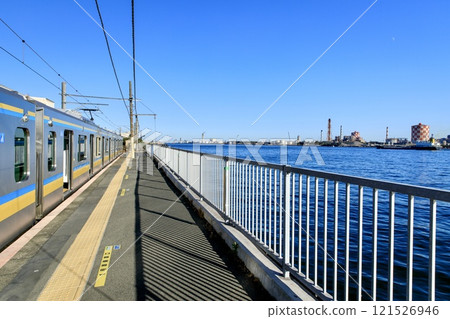 Yokohama City, Umi-Shibaura Station platform and Tsurumi Line E131 series train 121526946