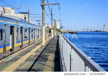 Yokohama City, Umi-Shibaura Station platform and Tsurumi Line E131 series train Yokohama City, Umi-Shibaura Station platform and Tsurumi Line E131 series train 121526947