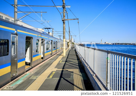 Yokohama City, Umi-Shibaura Station platform and Tsurumi Line E131 series train Yokohama City, Umi-Shibaura Station platform and Tsurumi Line E131 series train 121526951