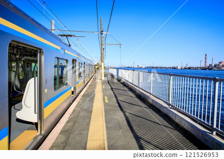 Yokohama City, Umi-Shibaura Station platform and Tsurumi Line E131 series train 121526953