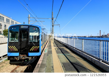 Yokohama City, Umi-Shibaura Station platform and Tsurumi Line E131 series train 121526955