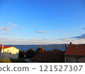 Croatian red-roofed houses and the sea against the blue sky 121527307