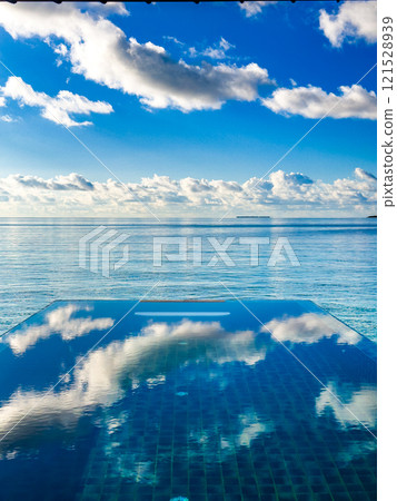Sunset views from overwater pool villa in Maldives Sunset views from overwater pool villa in Maldives 121528939