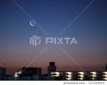 The moon rising at winter dawn The moon rising at winter dawn 121529923