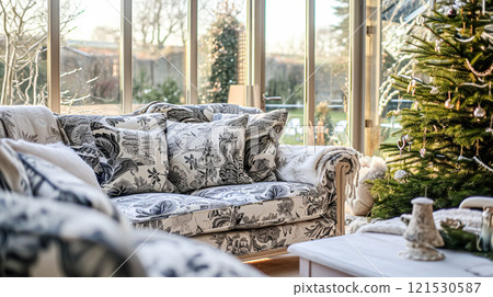 Colorful pillows on sofa against glass wall of window in a winter garden or conservatory. Interior textile concept. High quality photo Colorful pillows on sofa against glass wall of window in a winter garden or conservatory. Interior textile concept. High quality photo 121530587