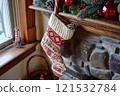 Christmas Stocking on Mantel with Candy Cane and Holiday Decor 121532784