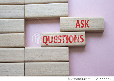 Ask Questions symbol. Wooden blocks with words Ask Questions. Beautiful pink background. Business and Ask Questions concept. Copy space. Ask Questions symbol. Wooden blocks with words Ask Questions. Beautiful pink background. Business and Ask Questions concept. Copy space. 121533569